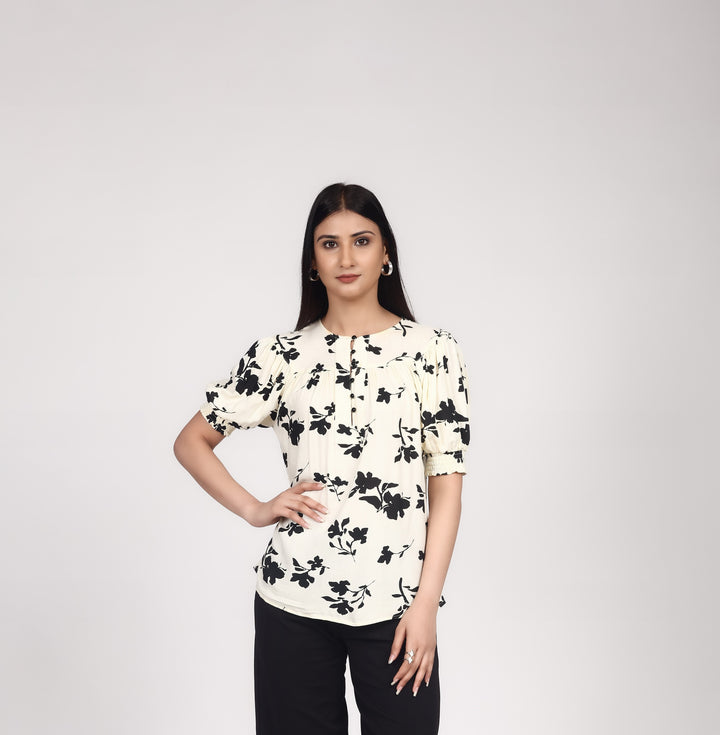 FLORAL SHORT SLEEVE TOP WITH SMOCKING DETAIL