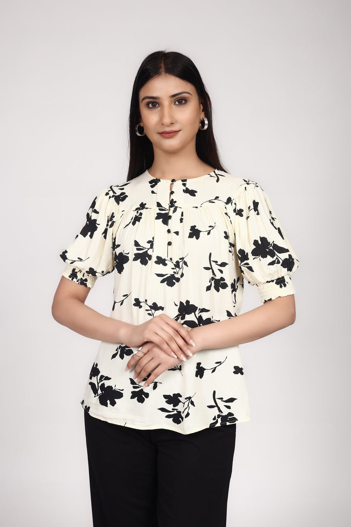 FLORAL SHORT SLEEVE TOP WITH SMOCKING DETAIL