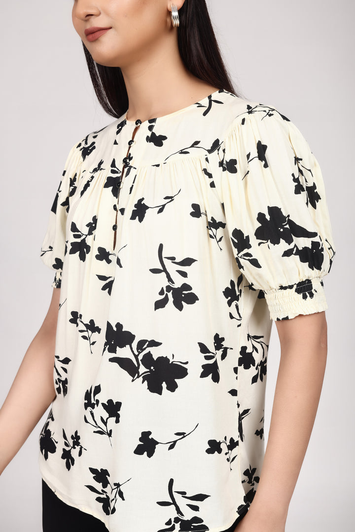 FLORAL SHORT SLEEVE TOP WITH SMOCKING DETAIL